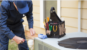 man fixing air conditioner